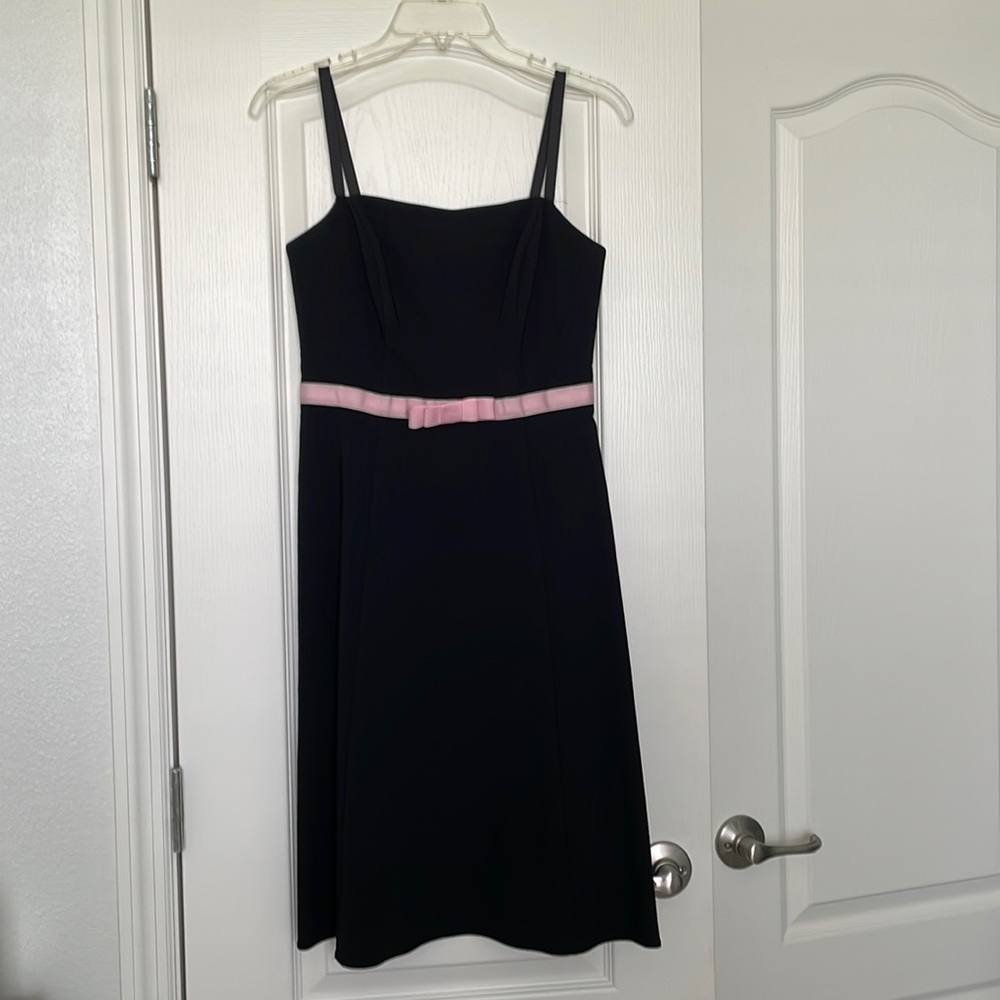 Strapless little black dress with pink gingham ribbon at the empire waist.